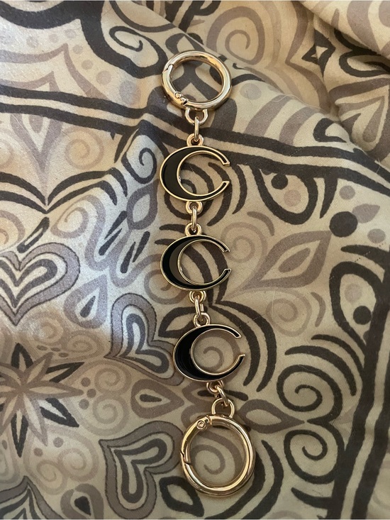 Accessories - Gold and Black Enamel Keychain with Linked Crescent Motifs